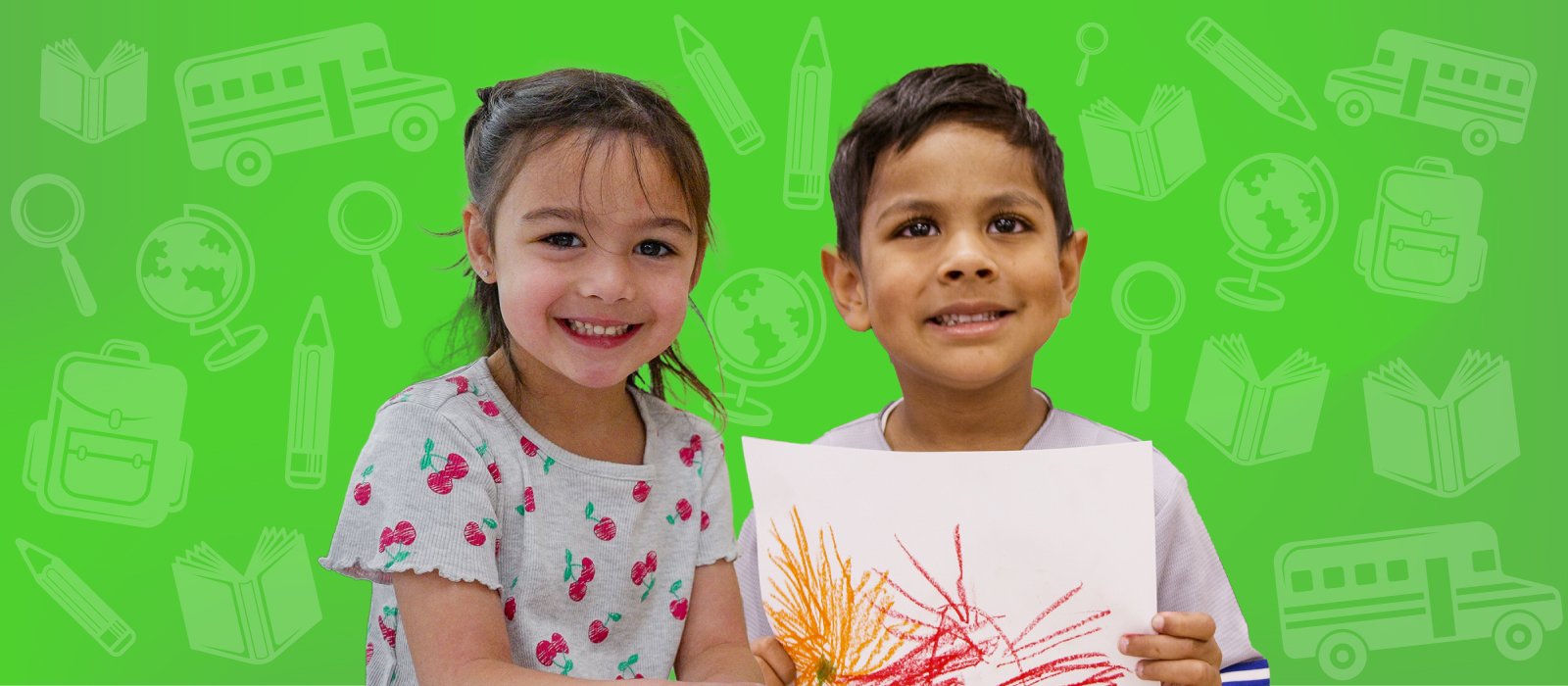 Two smiling Kindergarten students on green background 