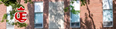 exterior picture of Queen Elizabeth Public School and their logo