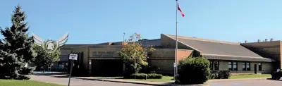 exterior picture of Dr. Ross Tilley Public School and their logo