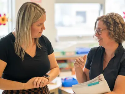 two teachers discussing