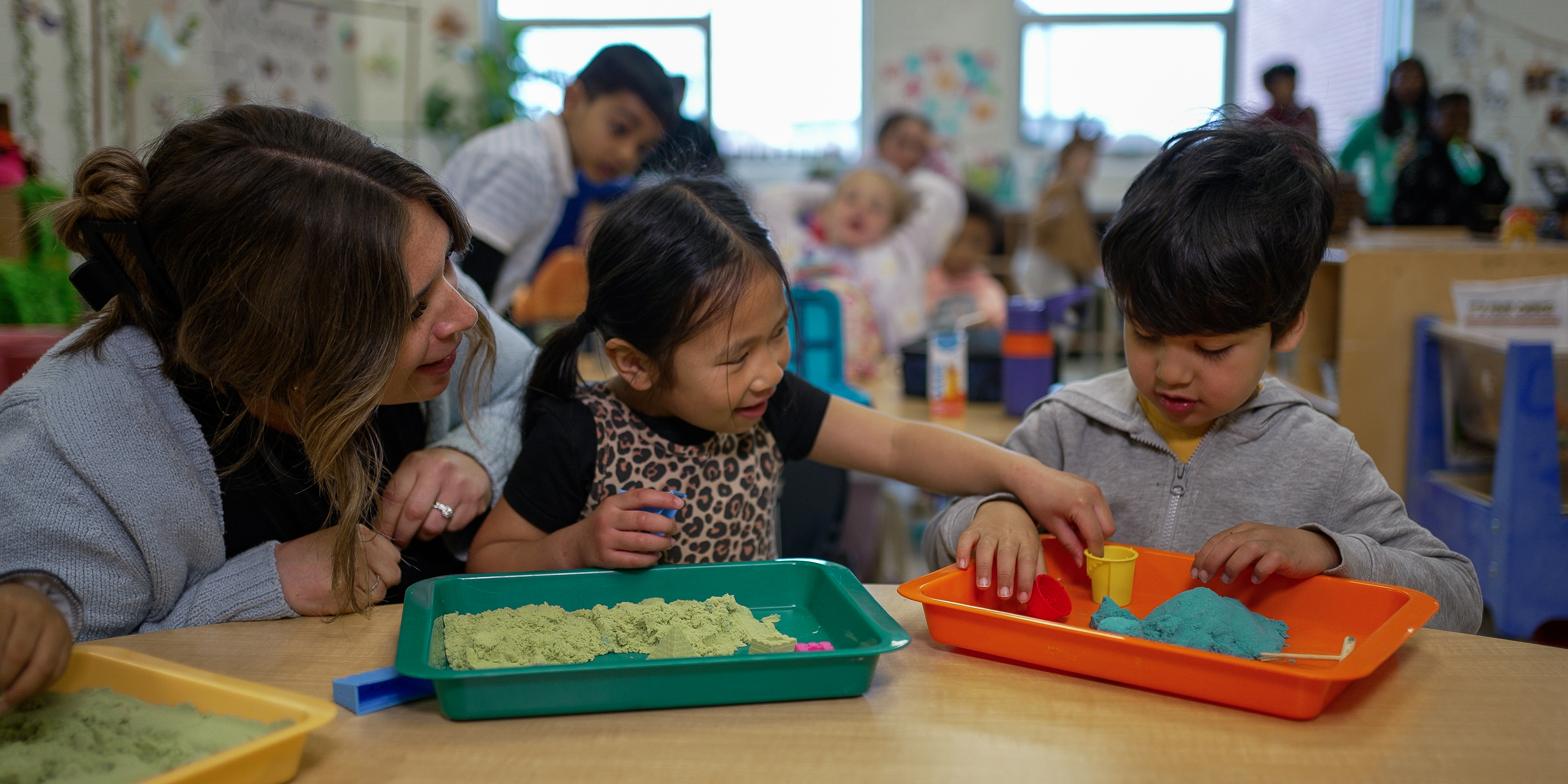 children playing with sand