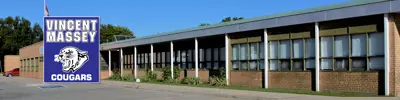 exterior picture of Vincent Massey Public School and their logo