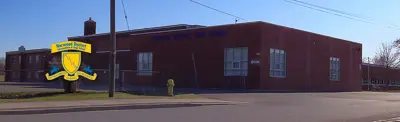 exterior picture of Norwood District High School and their logo