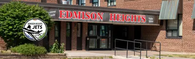 exterior picture of Edmison Heights Public School and their logo