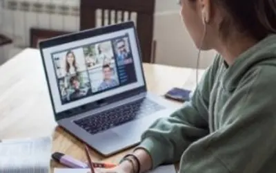 person using her laptop