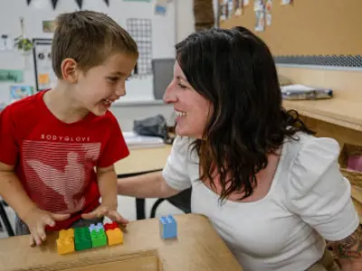 teacher with a student